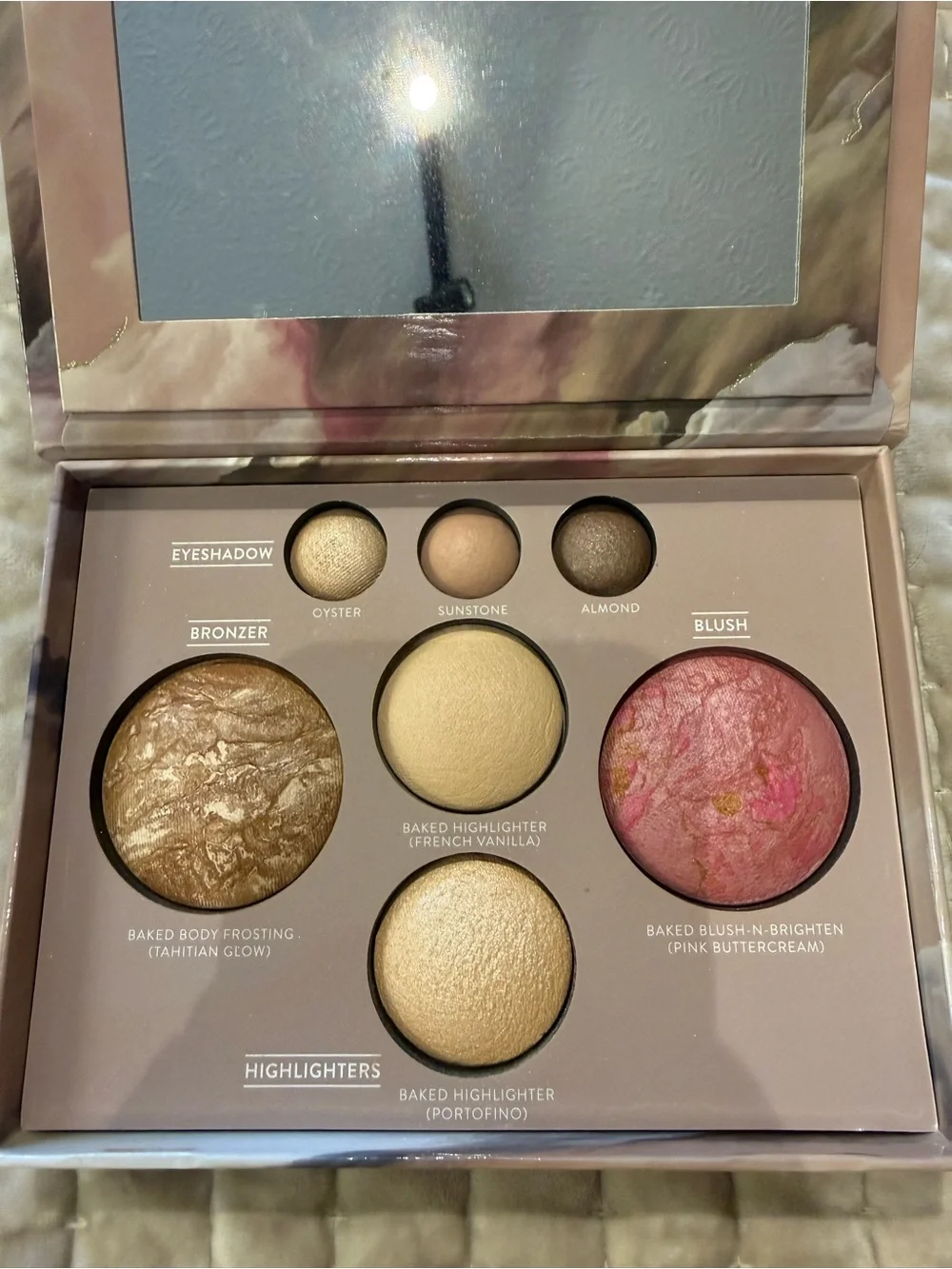 Laura Geller Pink and Mauve Marble Face Palette with Gold Accents
